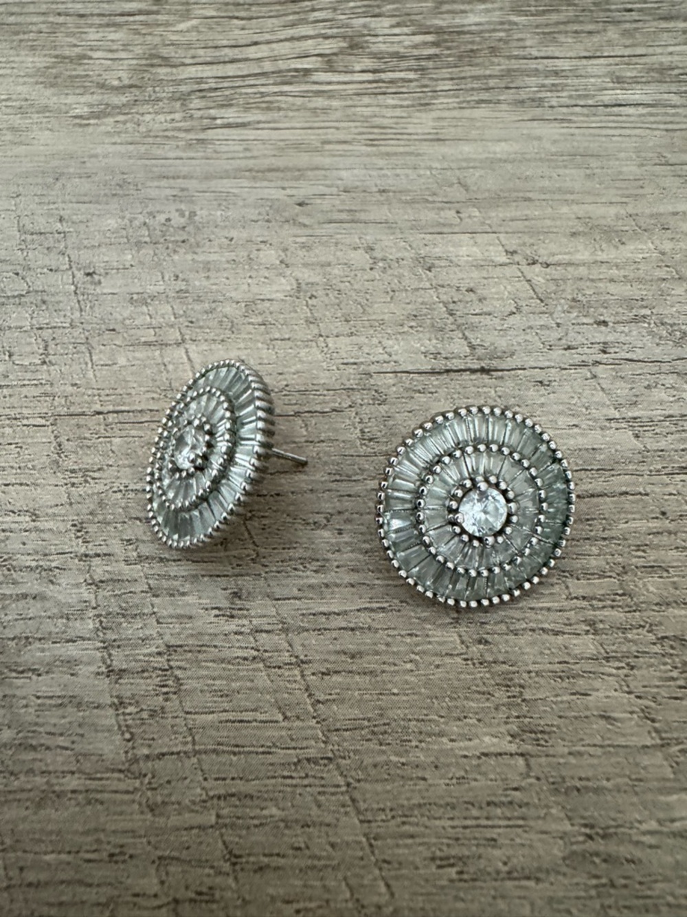 Silver-Tone Radiant Round Stud Earrings with Center Crystal. Two earrings